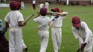 Children playing cricket in Sri Lanka