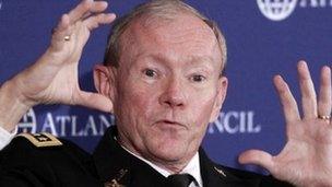 Joint Chiefs Chairman Army Gen Martin Dempsey speaks at the Atlantic Council in Washington, 9 December