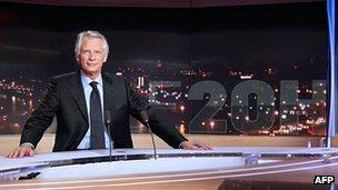Former Prime Minister Dominique de Villepin poses prior to the start of his interview with TV channel TF1 on 11 December.