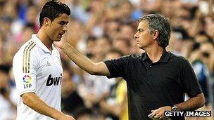 Real Madrid manager Jose Mourinho (r) with star player Cristiano Ronaldo