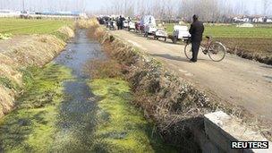 Scene of the school bus accident that left 15 children dead in Jiangsu province, China, on 13 December 2011