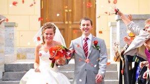 Stock photo of a couple celebrating a recent marriage