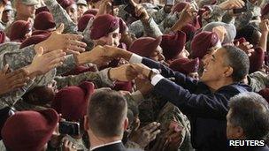 US President Barack Obama welcomes troops returning from Iraq at Fort Bragg, North Carolina, to mark the end of the Iraq War 14 December 2011