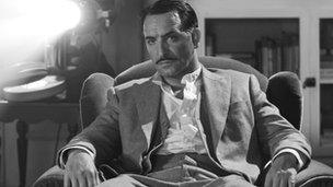 Jean Dujardin portrays George Valentin in The Artist