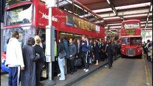 People getting on a bus