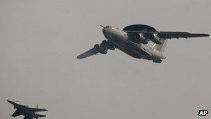 An Indian air force IL76 (right) and Sukhoi-30