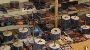 Piles of counterfeit DVDs in private premises