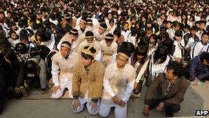 Family and relatives mourn Xue Jinbo in Wukan, China, 16 December