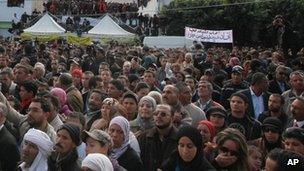 Tunisians gather in central Tunisia to celebrate the first anniversary of the revolution.