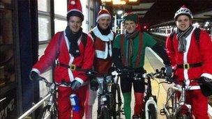 Charity bike ride santas and elf