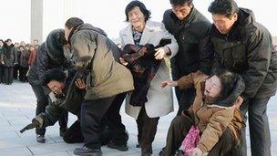 Pyongyang residents upset at the news of Kim Jong-il's death on 19 December 2011