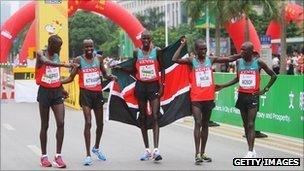 Kenya's men's team win gold at the IAAF World Half Marathon Championships in 2010 in Nanning, China.