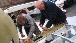 Members of Enstone Flying Club building the first of 12 Mk 26B Spitfires