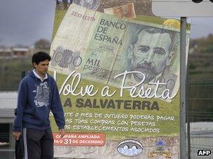 Poster showing peseta note in Salvaterra, northwest Spain