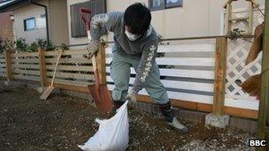 Volunteers at Minamisoma digging gravel