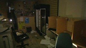 Internet cafe after rioters looted it