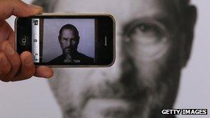 iPhone taking a picture of Apple founder Steve Jobs