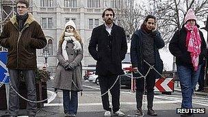 Opposition MPs chained up in parliament protest, Budapest, 23 Dec 11