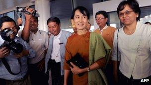 Aung San Suu Kyi arrives at the capital's airport (23 Dec 2011)