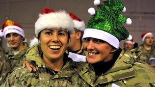 Troops holding a carol service at Camp Bastion, Afghanistan