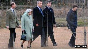 (Left to right) Prince Edward, The Queen, security officer, Vice-Admiral Tim Laurence and Princess Anne