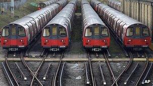 Tube trains sit at a depot in Morden, south London, on Monday