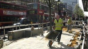 Construction workers on Oxford Street in central London