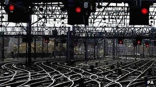 Train signals and switches ahead of a station