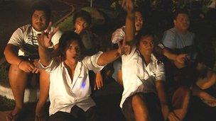 Boys in Samoa celebrate time zone change. Still from video by Rico Tupai.