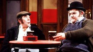 Ronnie Corbett and Ronnie Barker sat at a pub table for a sketch