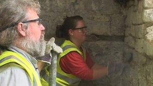 Martin Hedley and his daughter Rowan carrying out renovation work