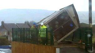 Wind damaged gas shelter