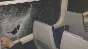 Smashed window on a train