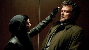 Rooney Mara and Yorick van Wageningen in The Girl with the Dragon Tattoo