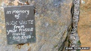 The plaque is stuck to Hadrian's Wall