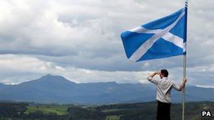 man looking over the Carse of Stirling