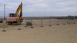 Digger at Great Yarmouth jetty