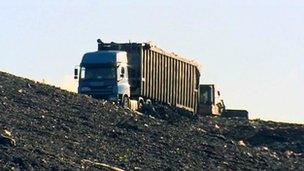 Lorry driving up to rubbish tip