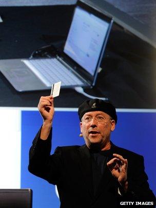 Intel's vice president Mooly Eden shows off the touch-less credit card reader at CES 2012