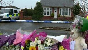 Floral tributes outside the house in Freckleton