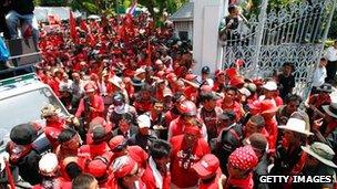 Anti-government 'red-shirt' protesters outside the parliament in Bangkok on 7 April 2010