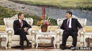 US Treasury Secretary Timothy Geithner (left) meets Chinese Vice President Xi Jinping (right) in Beijing on 11 January 2012