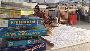 Furniture, board games and a large cuddly toy