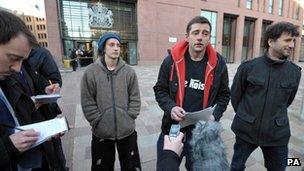 Occupy protesters talking to reporters outside Bristol County Court