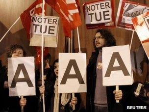 Demonstrators from the Parti de Gauche protest the rumoured downgrade of France's AAA rating