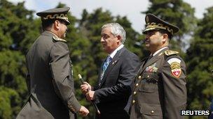 President Otto Perez Molina (c) during the ceremony appointing him as commander of the Army