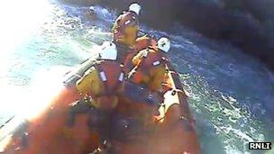 St Catherine's lifeboat crew rescuing a kayaker