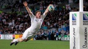 Chris Ashton celebrates scoring a try for England against Georgia in the 2011 World Cup