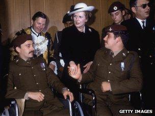 Margaret Thatcher with wheelchair-bound veterans, 1982