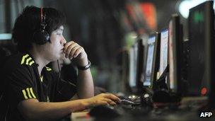 Web-surfer at internet cafe in Beijing, May 2011